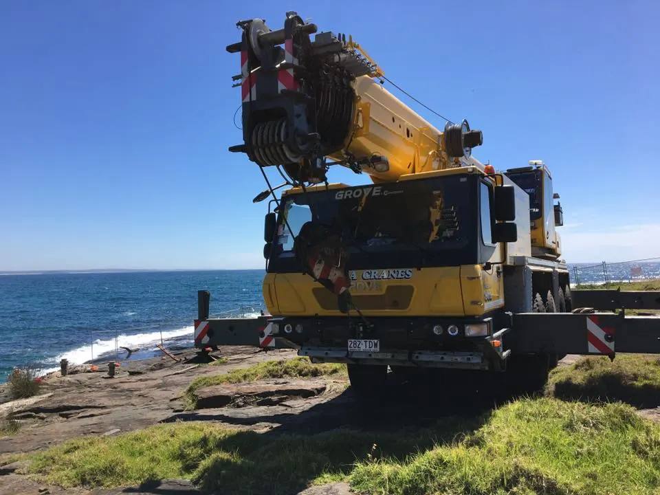Crane placing structural steel